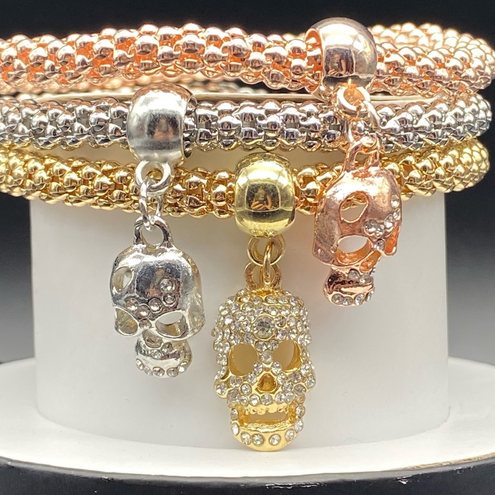 Gold and Silver Skull Charm Bracelet Set
